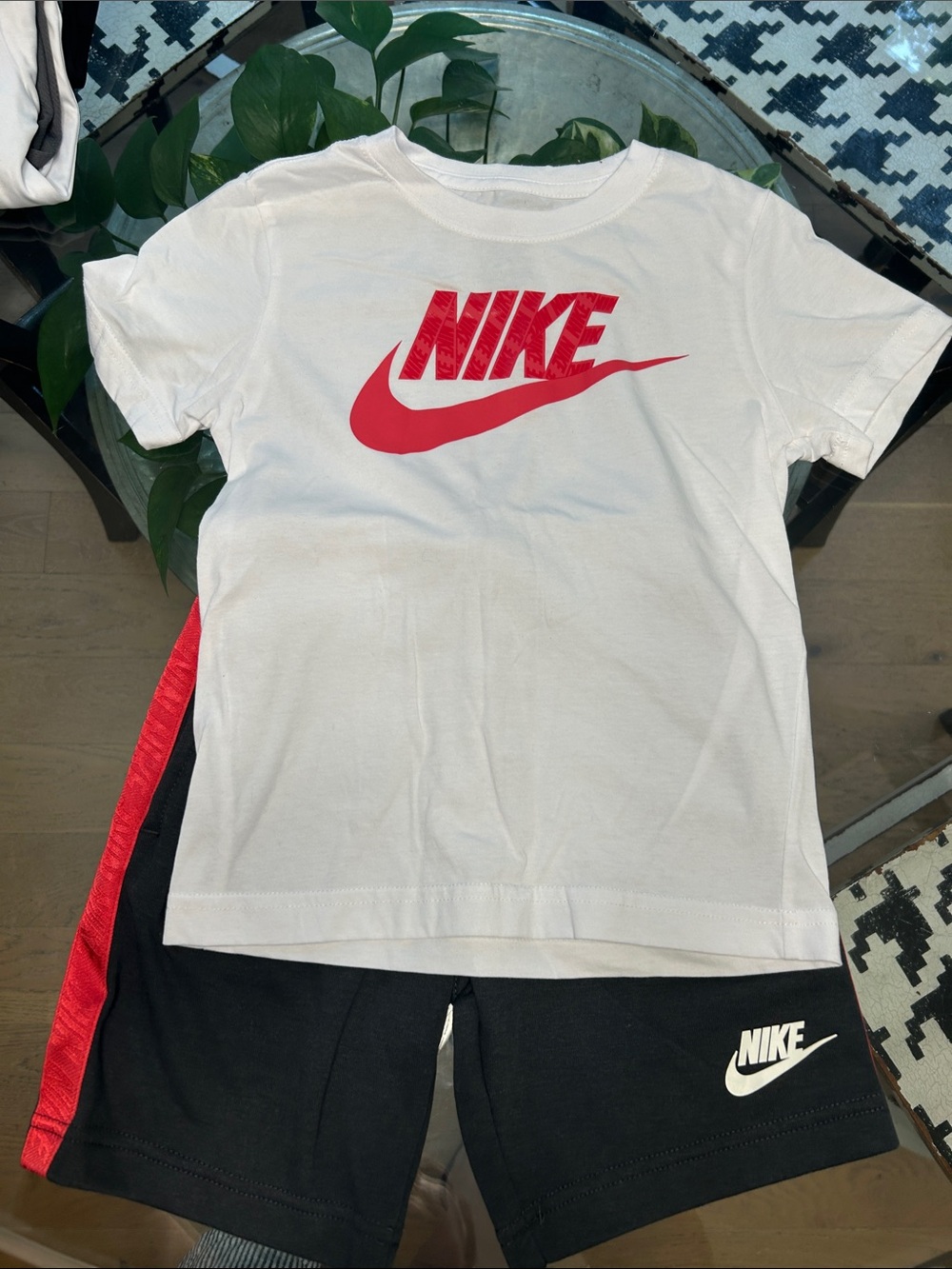 Nike White Tee with Red Swoosh Logo
